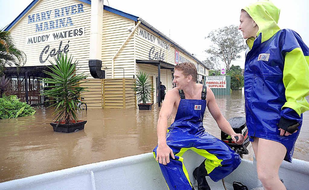 Floodwaters around the Mary River Marina and Muddy Waters Cafe - Tony Hosking and Nina Arnold who live on a houseboat on the Mary River inspect the flooding. Floodwaters around the Mary River Marina and Muddy Waters Cafe - Tony Hosking and Nina Arnold who live on a houseboat on the Mary River inspect the flooding.